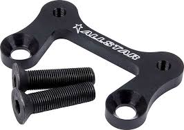 Spacing a brake caliper bracket